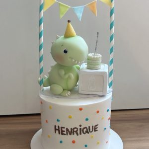 Topo de bolo Dino baby em biscuit
